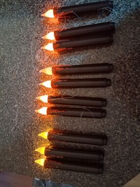 String of Black LED Candle Lights with Warm Amber Flames